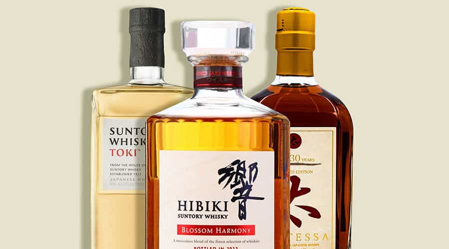 Trois bouteilles de whiskys japonais